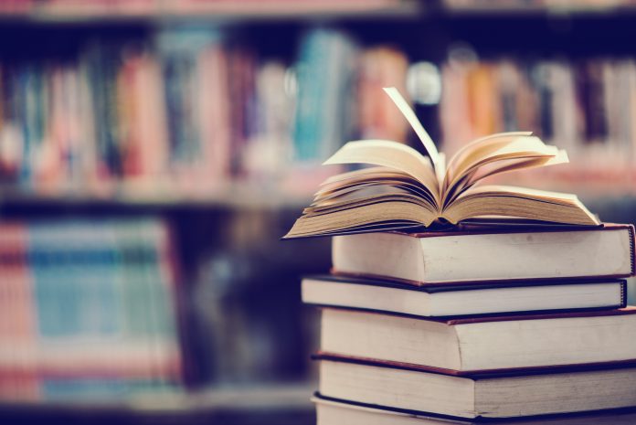Book in library with open textbook,education learning concept premios princesa de asturias